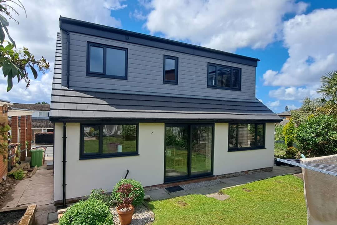 A house with a large yard and garden renovated by O.B. Construction Northern Ltd.